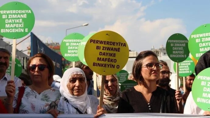 Têkoşerên ziman